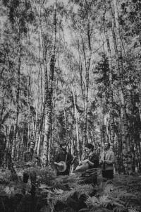 Pallet of Leaves playing music in the woods